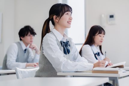 High school students enjoying class in a classroom